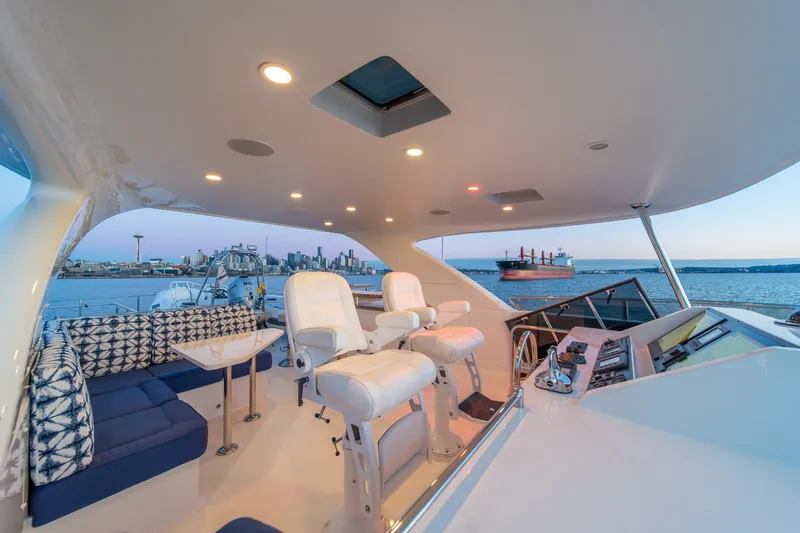 Slide: The Image of Luxurious 2013 Ocean Alexander 72 Pilothouse yacht interior with city skyline view. - 7