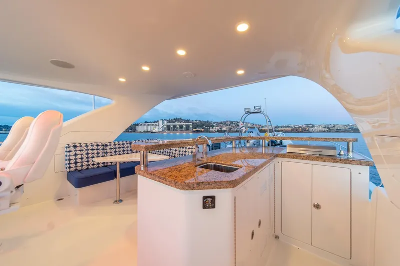 Slide: The Image of Luxurious 2013 Ocean Alexander 72 Pilothouse yacht interior with elegant seating and granite countertop. - 8