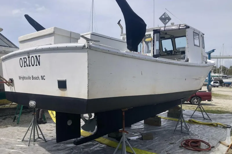 Slide: The Image of 1986 BGM Custom boat "Orion" on stands at Wrightsville Beach, NC. - 3