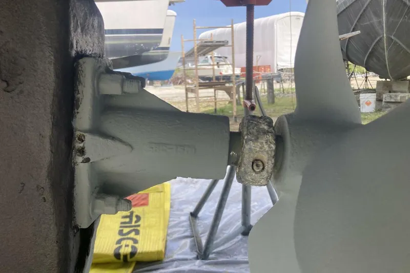 Slide: The Image of Boat propeller and shaft assembly of a 1986 BGM Custom vessel in a shipyard. - 37