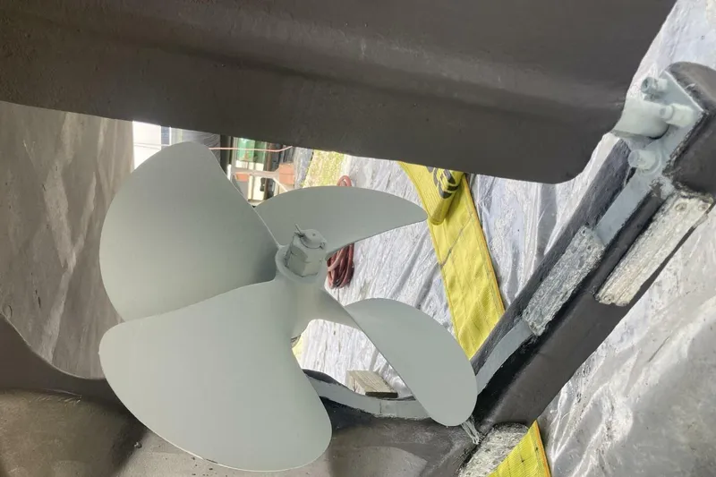 Slide: The Image of 1986 BGM Custom boat propeller, close-up view, showcasing its design and structure. - 42