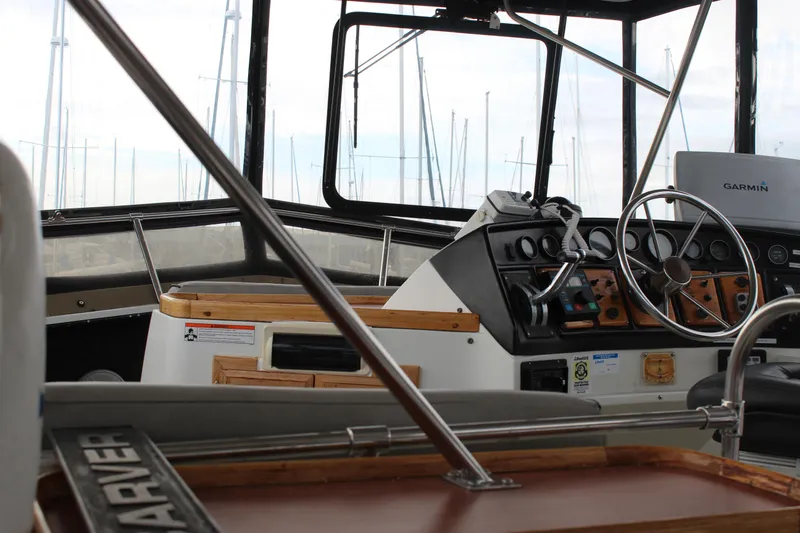 Slide: The Image of 1987 Carver 36 Aft Cabin Motor Yacht helm with Garmin navigation system. - 6