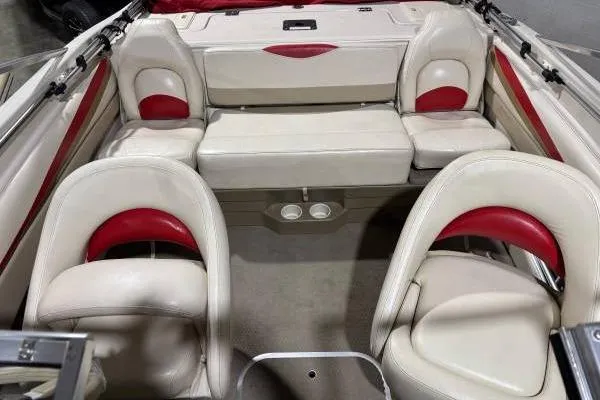 Slide: The Image of Trailer wheel of 2003 Glastron/Carlson GX180 boat on red frame. - 5