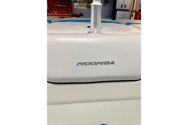 Slide: The Image of Interior view of a 2012 Moomba Mojo 2.5 boat, showcasing seating and storage area. - 21