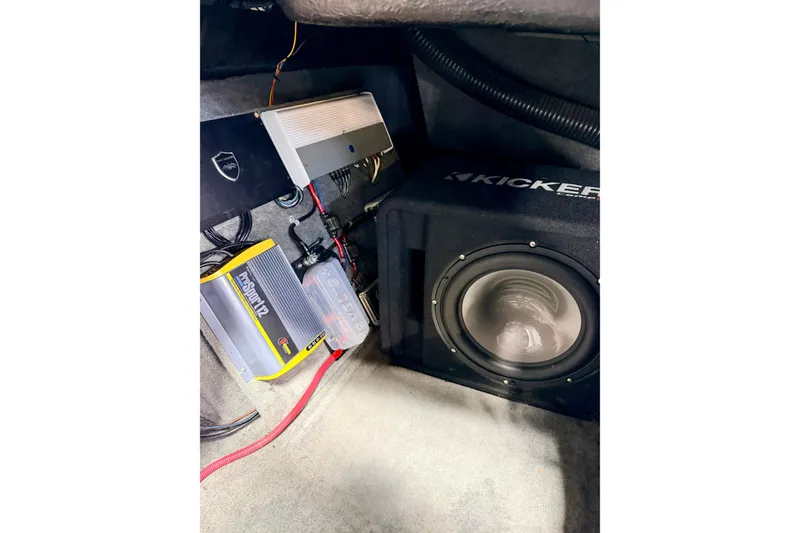 Slide: The Image of Battery switch in a 2012 Moomba Mojo 2.5 boat, featuring red cables and Perko branding. - 24