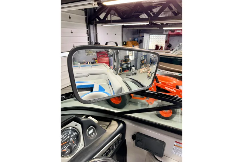 Slide: The Image of Dashboard of a 2012 Moomba Mojo 2.5 boat with ignition and gauges. - 29