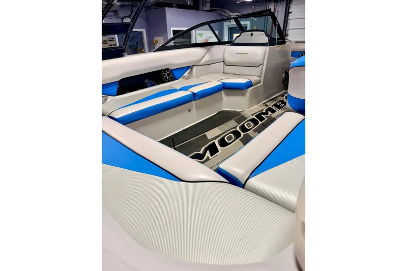 Slide: The Image of 2012 Moomba Mojo 2.5 boat cockpit with steering wheel and dashboard controls. - 40