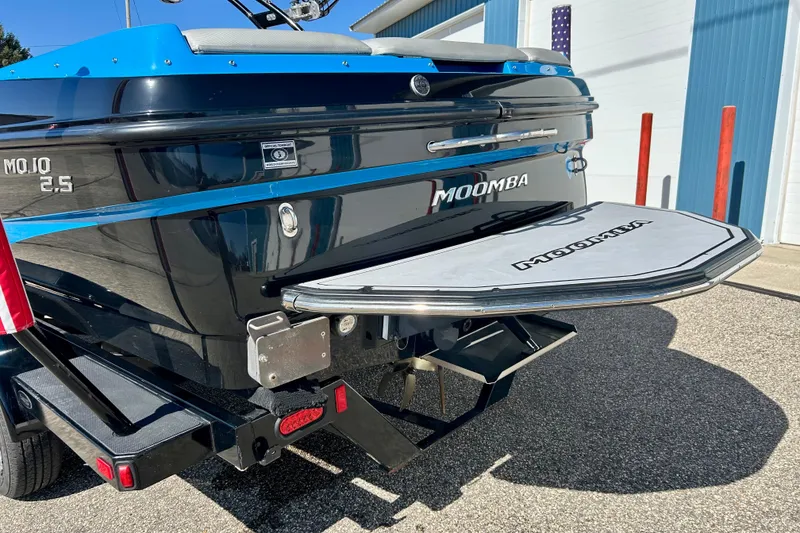 Slide: The Image of 2012 Moomba Mojo 2.5 trailer with dual wheels on asphalt surface. - 45