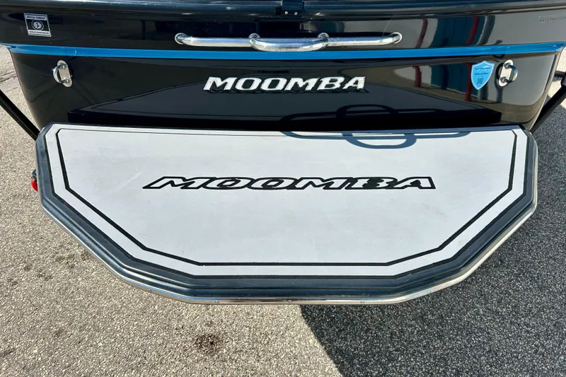 Slide: The Image of 2012 Moomba Mojo 2.5 boat rear view with swim platform in sunlight. - 46
