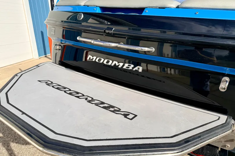 Slide: The Image of 2012 Moomba Mojo 2.5 boat rear view with swim platform and logo. - 6