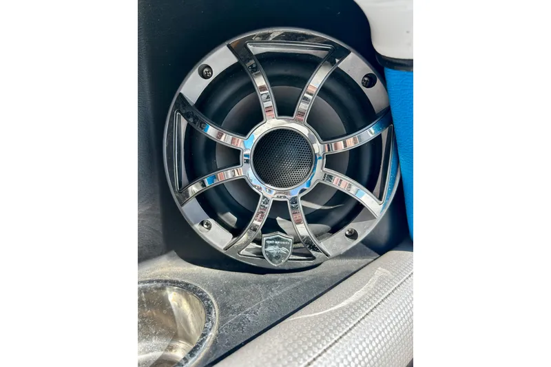 Slide: The Image of Speaker detail on 2012 Moomba Mojo 2.5 boat with blue upholstery. - 65