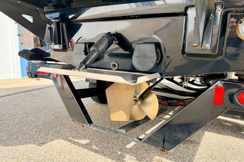 Slide: The Image of 2012 Moomba Mojo 2.5 boat propeller and trailer detail in sunlight. - 7