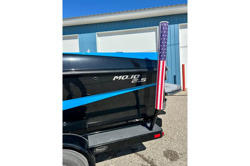 Slide: The Image of 2012 Moomba Mojo 2.5 boat interior with gray and blue seating. - 71