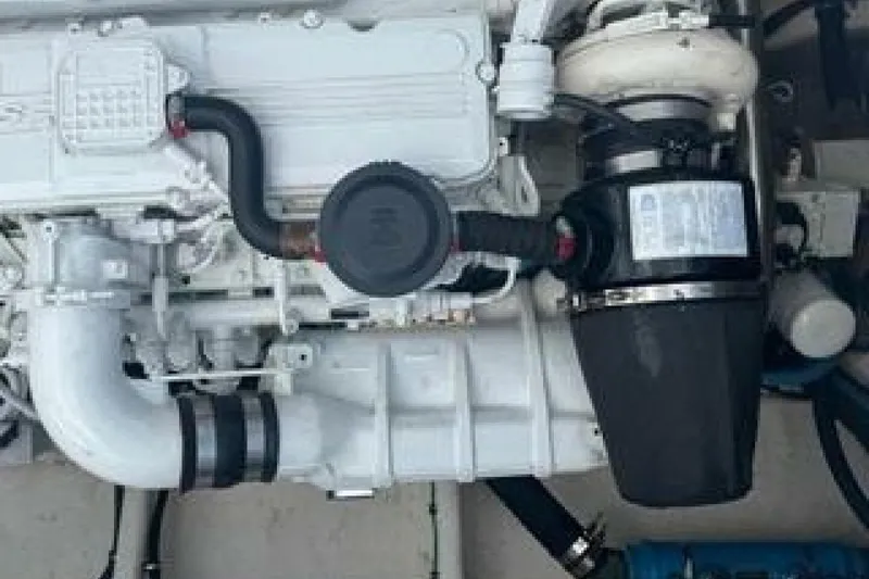 Slide: The Image of Engine of 2019 OceanPro 35 boat, showcasing intricate mechanical components. - 4