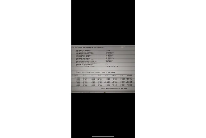 Slide: The Image of Engine data display for 2012 Cobalt 242, showing ECM software and hardware information. - 14