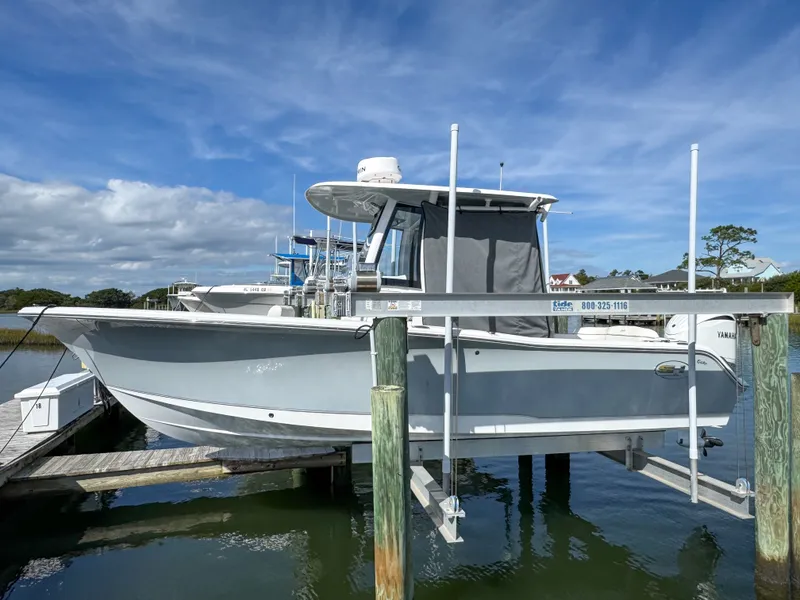 The Image of 2023 Sea Hunt Ultra 239 SE boat at dock. - 0
