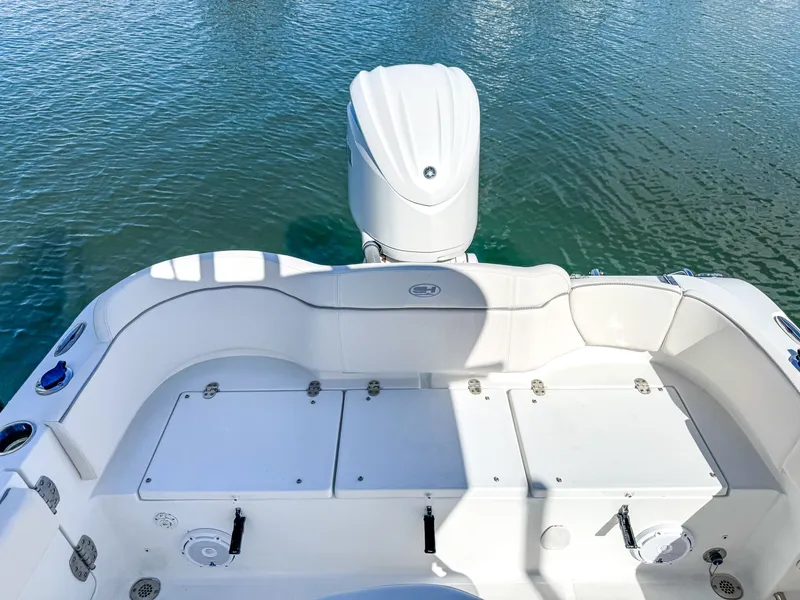 Slide: The Image of Aft view of Sea Hunt Ultra 239 SE boat, 2023 model. - 27