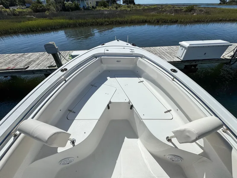 Slide: The Image of Interior view of 2023 Sea Hunt Ultra 239 SE boat at dock. - 5
