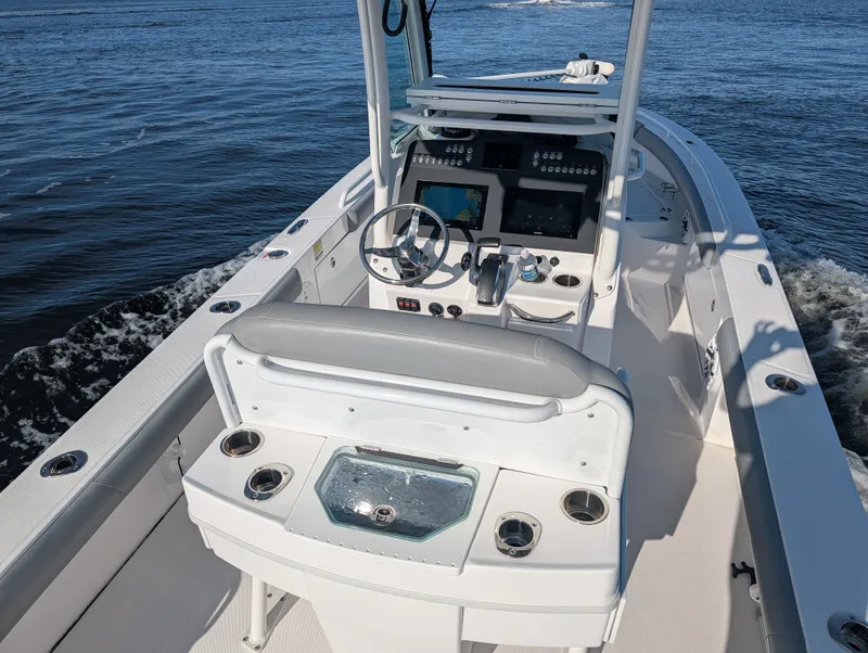 Slide: The Image of 2024 Everglades 253 Center Console on the water. - 3