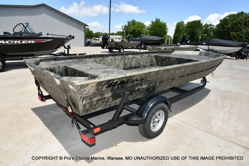Slide: The Image of 2026 Tracker Grizzly 1860 Jon boat on trailer outdoors. - 15