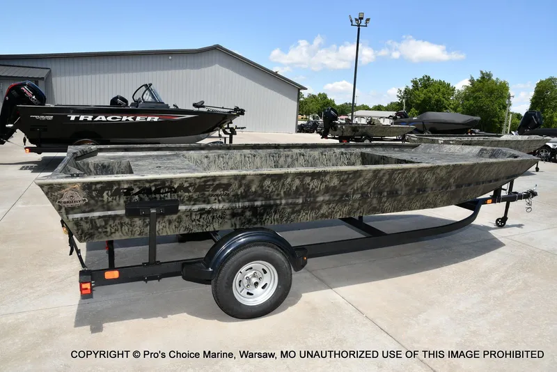 Slide: The Image of 2026 Tracker Grizzly 1860 Jon boat on trailer outdoors. - 16