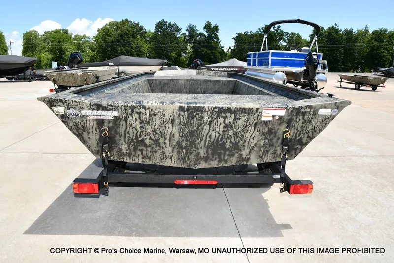 Slide: The Image of 2026 Tracker Grizzly 1860 Jon boat on trailer outdoors. - 17