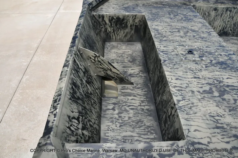 Slide: The Image of Tracker Grizzly 1860 Jon 2026 with camouflage pattern design. - 27