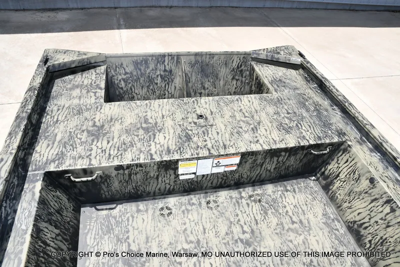 Slide: The Image of Tracker Grizzly 1860 Jon 2026 boat with camouflage pattern design. - 38