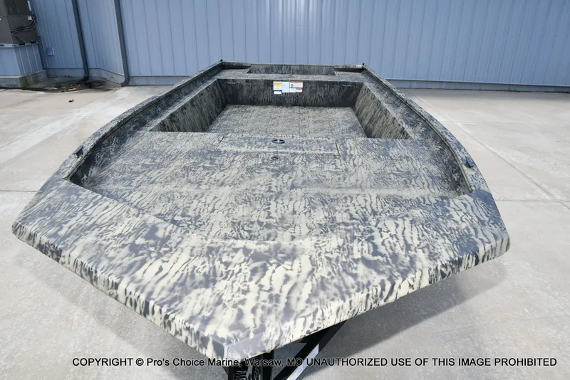 Slide: The Image of 2026 Tracker Grizzly 1860 Jon boat with camouflage pattern. - 9