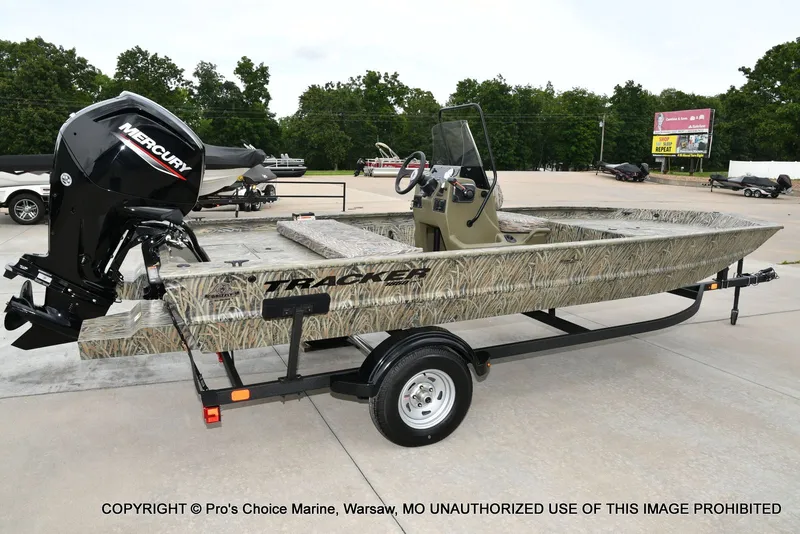 Slide: The Image of 2026 Tracker Grizzly 1860 CC boat on trailer, exterior view. - 17