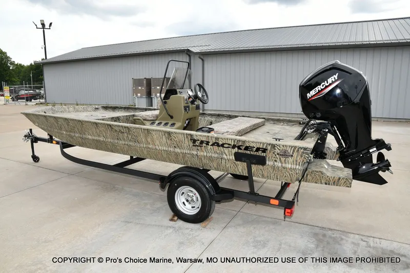 Slide: The Image of 2026 Tracker Grizzly 1860 CC boat on trailer, exterior view. - 22