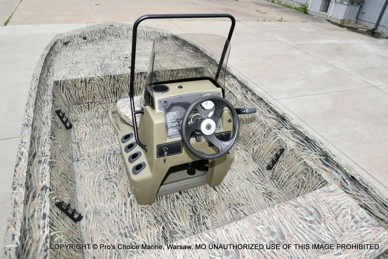 Slide: The Image of 2026 Tracker Grizzly 1860 CC boat with camouflage design. - 36