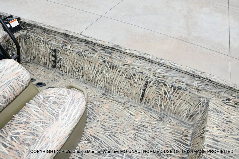 Slide: The Image of 2026 Tracker Grizzly 1860 CC with camouflage pattern design. - 48