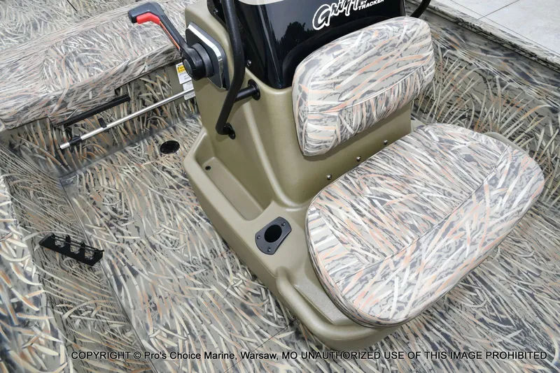 Slide: The Image of Interior of 2026 Tracker Grizzly 1860 CC with camouflage pattern. - 49