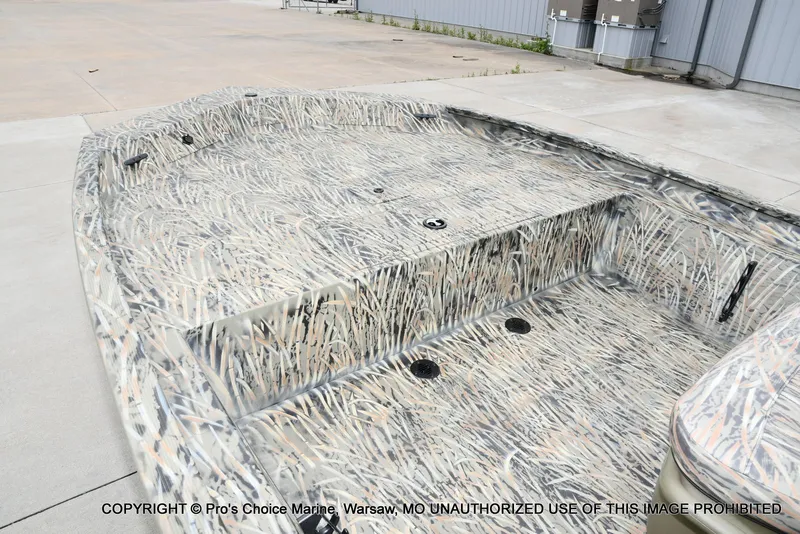 Slide: The Image of 2026 Tracker Grizzly 1860 CC boat with camouflage pattern. - 5