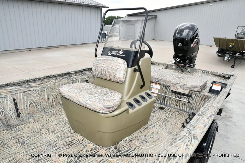 Slide: The Image of 2026 Tracker Grizzly 1860 CC boat with camouflage design. - 8