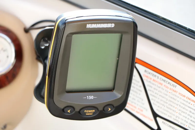 Slide: The Image of Humminbird fish finder on 2010 Tahoe Q5i SF boat dashboard. - 22