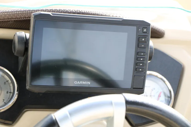 Slide: The Image of Garmin GPS device on 2016 Crest II 250 boat dashboard. - 20