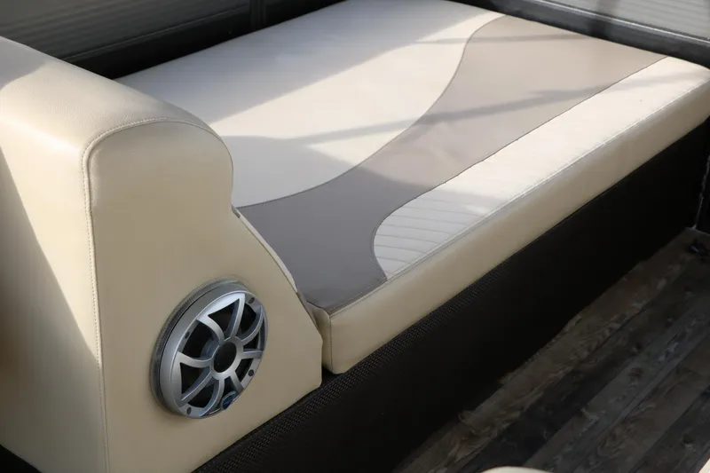 Slide: The Image of Crest II 250 boat seat with built-in speaker, 2016 model, beige and gray upholstery. - 29