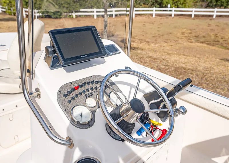 Slide: The Image of 2023 Carolina Skiff 17 LS helm with Garmin display. - 12