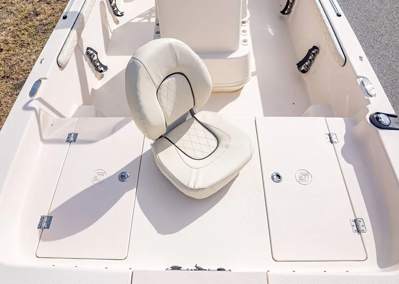 Slide: The Image of Interior of 2023 Carolina Skiff 17 LS with seat and storage. - 16