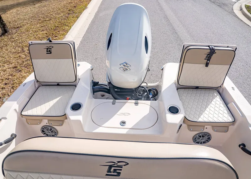 Slide: The Image of Interior of a 2023 Carolina Skiff 17 LS boat with cushioned seats. - 5