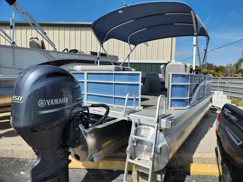 Slide: The Image of 2023 Bennington 22SXL pontoon boat with Yamaha engine. - 3