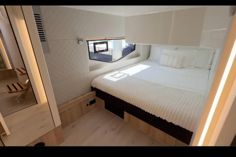 Slide: The Image of Luxurious bedroom interior of 2026 Cobra Yachts Seamaster 45, featuring modern design and cozy bedding. - 21