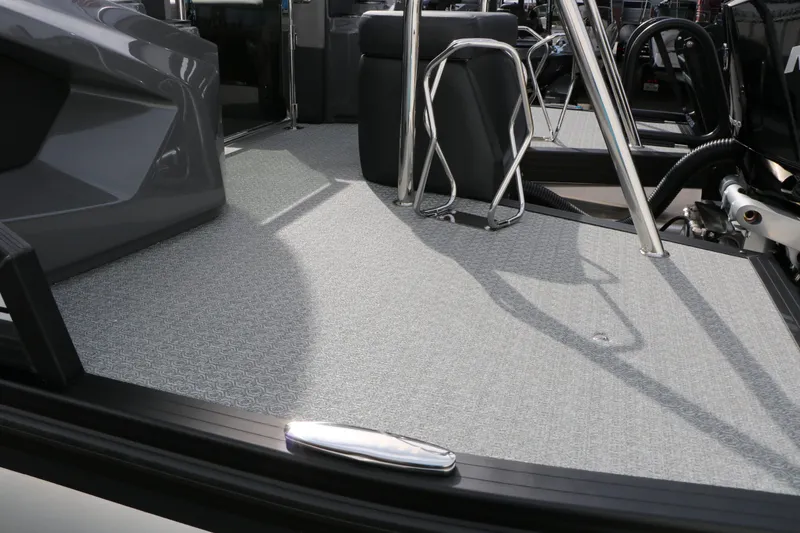 Slide: The Image of Interior of 2026 Evotti 723 QL Tri Toon with gray flooring. - 13