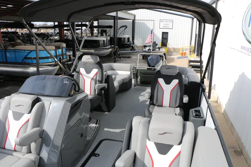 Slide: The Image of Evotti 723 QL Tri Toon 2026 with luxurious interior seating. - 23