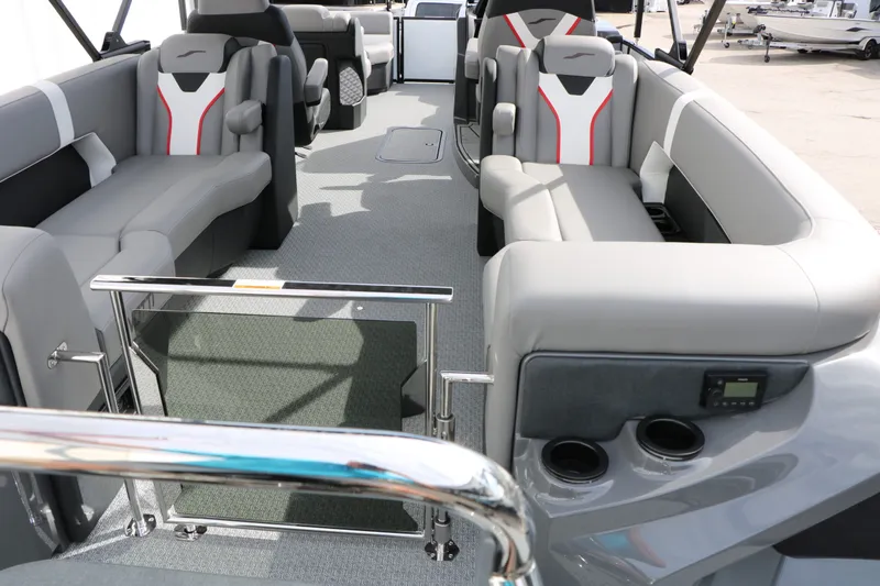 Slide: The Image of Interior of 2026 Evotti 723 QL Tri Toon with gray seating. - 28