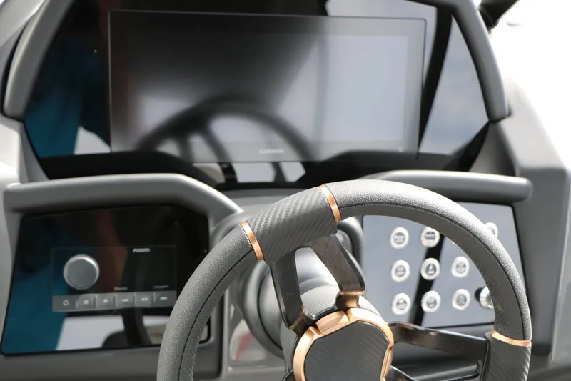 Slide: The Image of Steering wheel and dashboard of Evotti 723 QL Tri Toon 2026. - 38