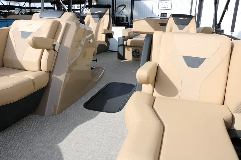 Slide: The Image of Interior of 2026 Evotti 523 CS Tri Toon with luxurious seating. - 22