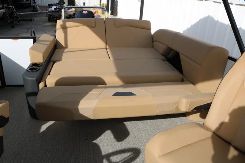 Slide: The Image of Evotti 523 CS Tri Toon 2026 with beige interior seating. - 28